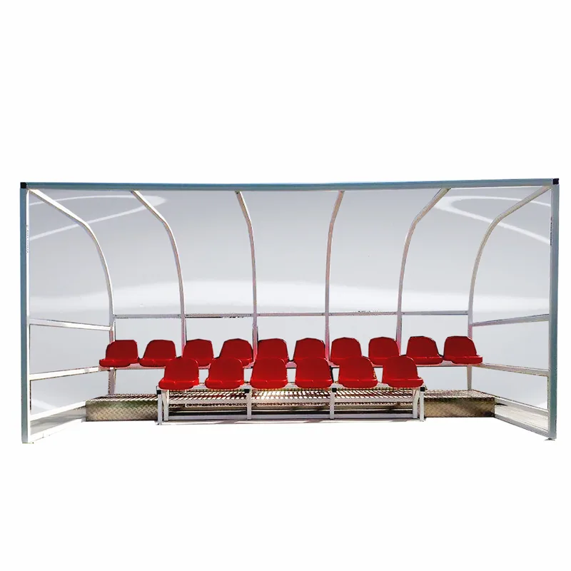 Home A modern, fixed aluminum frame Sports Dugout / Team Shelter with UV-resistant polycarbonate panels providing seating for players at a sports stadium in Pakistan.